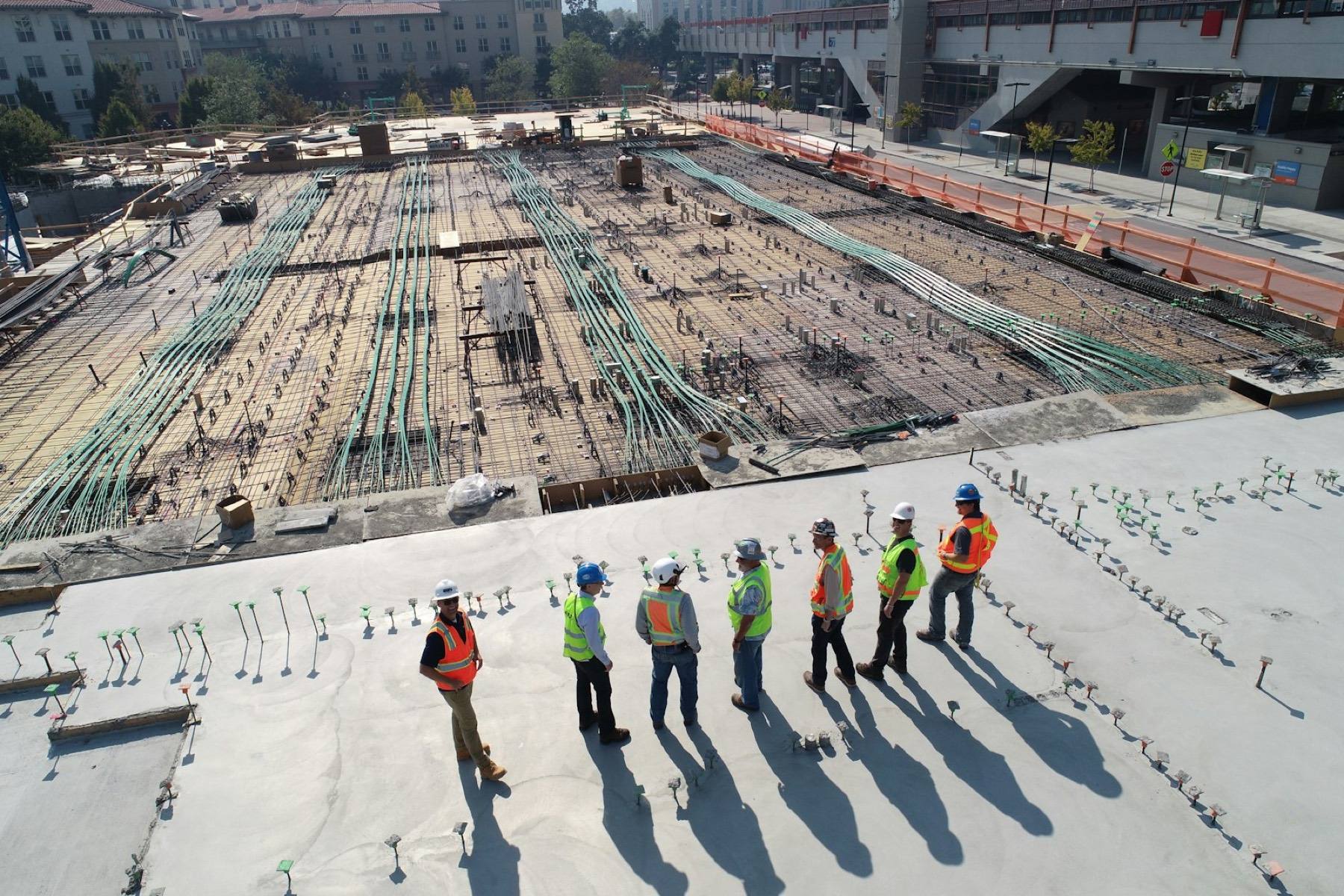 Landmark team walking an active development site